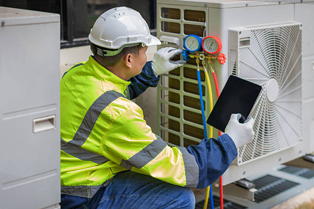 Professional Hvac technician working in Sharpes, FL